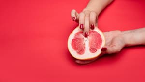 Finger in Grapefruit
