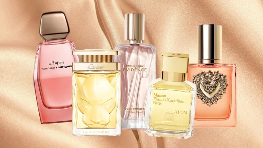 Verschiedene Parfums auf einem seidigen Hintergrund
