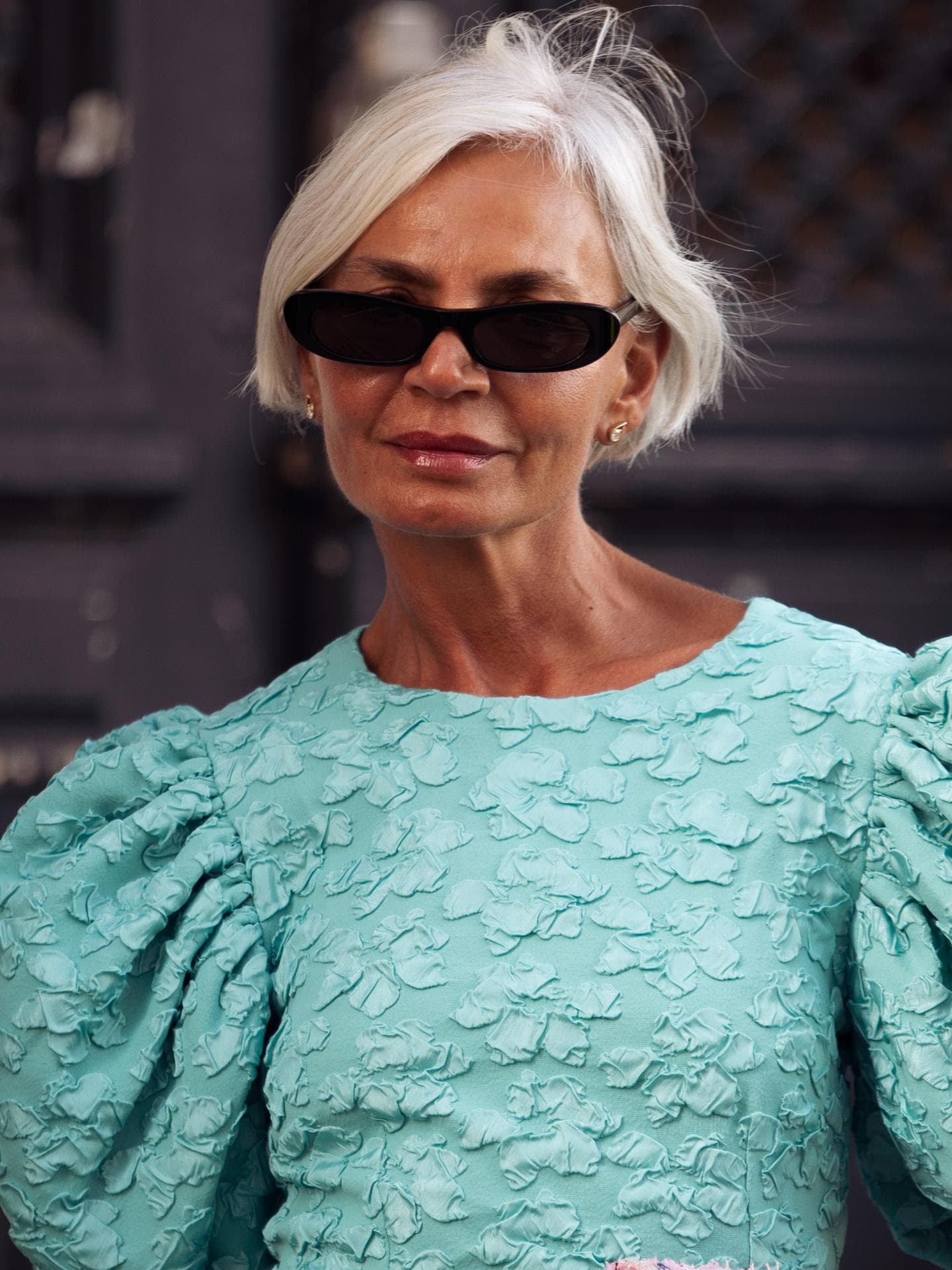 Grece Ghanem Copenhagen Fashion Week im mintgrünen Kleid mit auffälligen Ärmeln