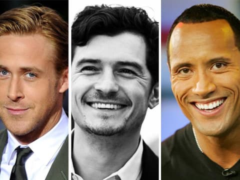 Ryan Gosling, Orlando Bloom, Dwayne Johnson lächeln