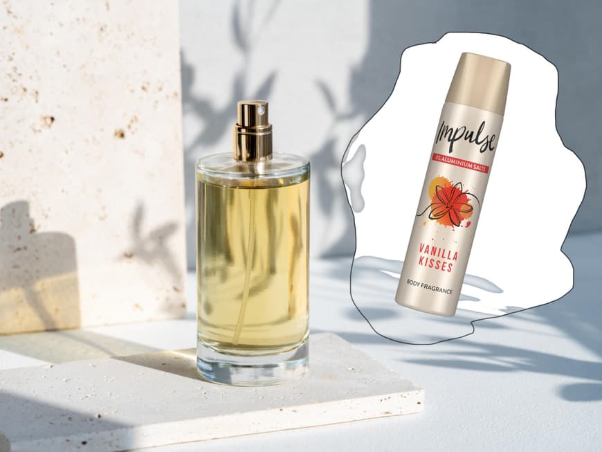 Parfum Flakon und Impulse Deo auf einem Marmor-Hintergrund.